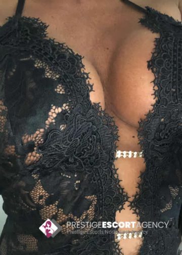 Lace detail black dress close-up