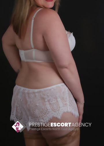 Woman in white lingerie from Prestige Escort Agency