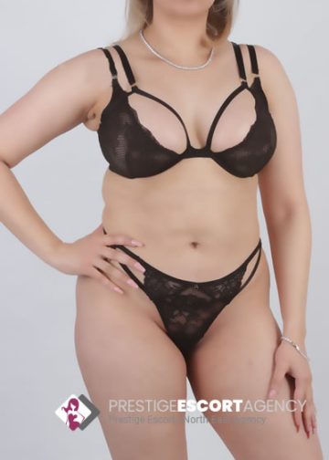 Woman in black lingerie, partial view